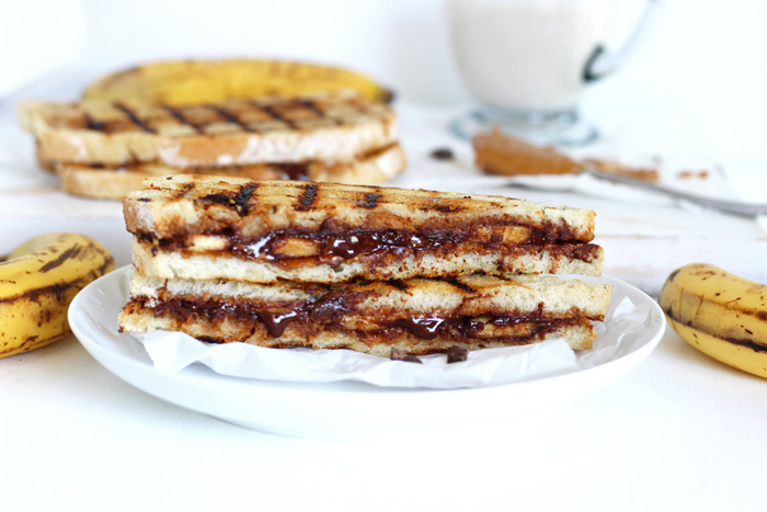 Grilled Chocolate Banana and Peanut Butter. Melted chocolate, creamy peanut butter and sweet bananas all wrapped up in one sandwich. All this amazingness in each and every bite! neuroticmommy.com #vegan #healthy