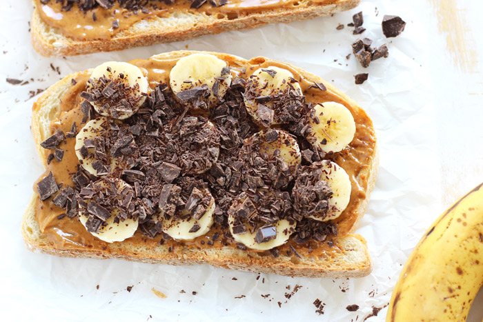 Grilled Chocolate Banana and Peanut Butter. Melted chocolate, creamy peanut butter and sweet bananas all wrapped up in one sandwich. All this amazingness in each and every bite! neuroticmommy.com #vegan #healthy