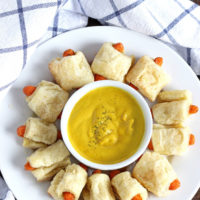 Carrots in a Blanket! A healthy, more delicious alternative to pigs in a blanket. Enjoy this appetizer that's not only good for you but cruelty free! NeuroticMommy.com #vegan #appetizers