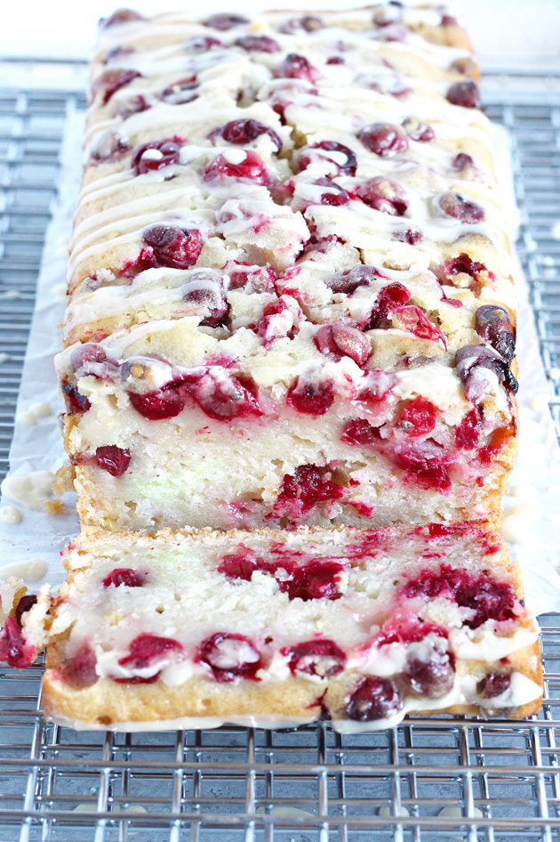 Vegan Cranberry Orange Loaf Cake - Luscious cranberry loaf cake drizzled with a sweet orange glaze. The perfect addition to holiday festivities. NeuroticMommy.com #vegan #thanksgiving