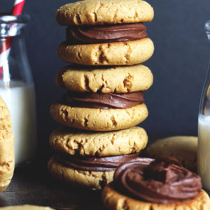 Chocolate Peanut Butter Sandwich Cookies are filled with a creamy chocolate filling surrounded by a soft, chewy peanutty cookie. NeuroticMommy.com #vegan #cookies #healthy