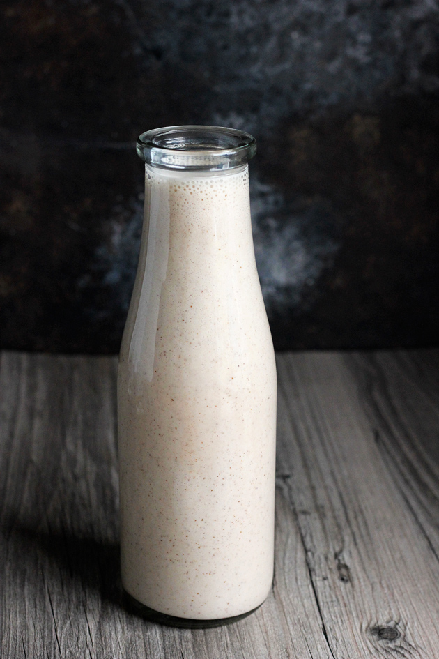 Vegan Coquito - A traditional sweet Puerto Rican Egg Nog-like alcoholic beverage that is served every Christmas. Enjoy this thick and creamy vegan version that tastes just like the real thing! NeuroticMommy.com #vegan #beverages 