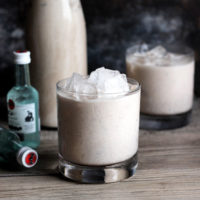 Vegan Coquito - A traditional sweet Puerto Rican Egg Nog-like alcoholic beverage that is served every Christmas. Enjoy these thick and creamy vegan version that tastes just like the real thing! NeuroticMommy.com #vegan #beverages