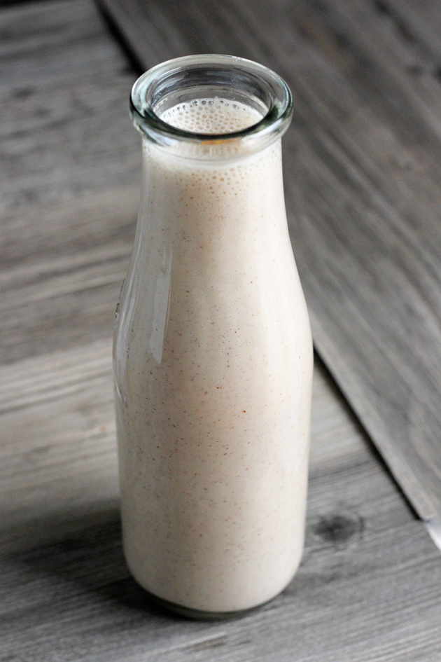 Vegan Coquito - A traditional sweet Puerto Rican Egg Nog-like alcoholic beverage that is served every Christmas. Enjoy this thick and creamy vegan version that tastes just like the real thing! NeuroticMommy.com #vegan #beverages