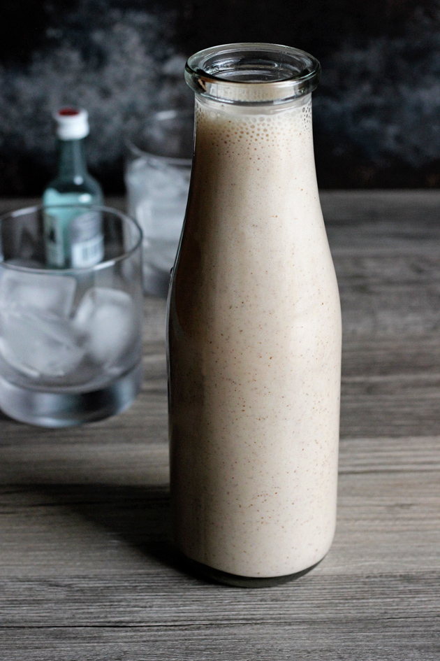 Vegan Coquito - A traditional sweet Puerto Rican Egg Nog-like alcoholic beverage that is served every Christmas. Enjoy this thick and creamy vegan version that tastes just like the real thing! NeuroticMommy.com #vegan #beverages