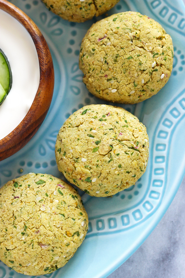 Baked Vegan Falafel - These baked patties are made with organic chickpeas and a healthy list of ingredients that not only will keep you properly nourished, but taste totally amazing. NeuroticMommy.com #vegan #healthy 