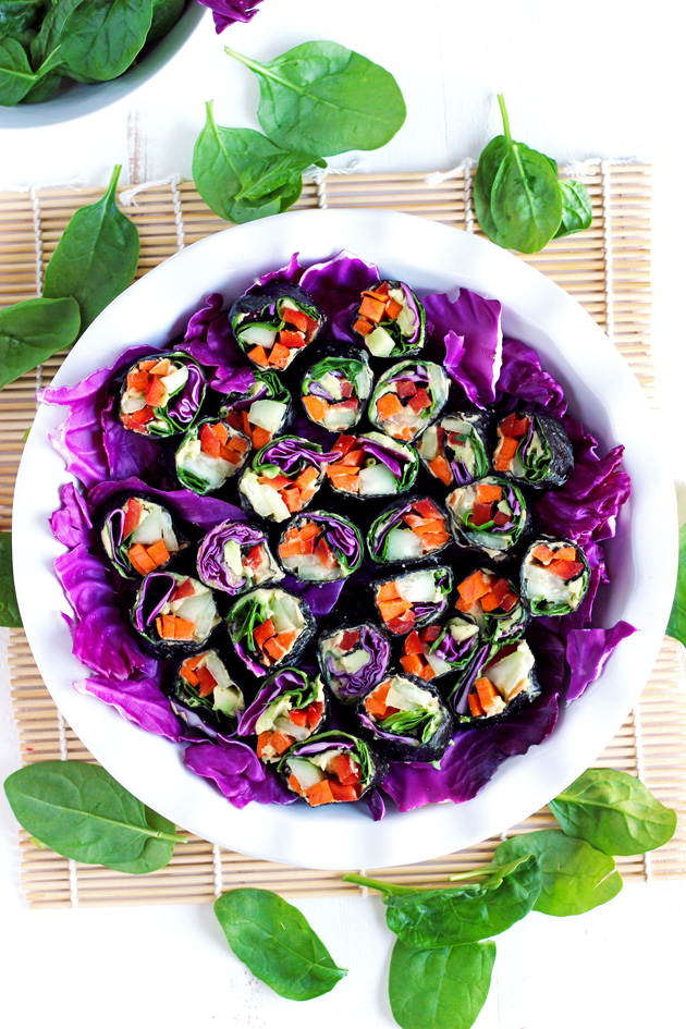 Healthy sushi rolls made with an array a raw veggies so you can eat the rainbow! NeuroticMommy.com #raw #vegan #healthy