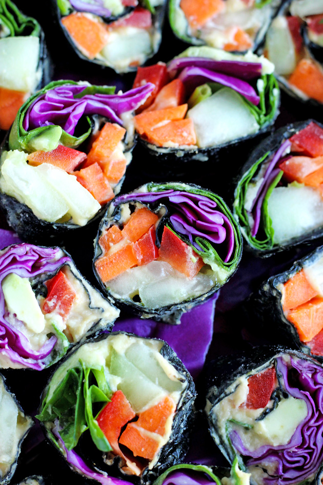 Healthy sushi rolls made with an array a raw veggies so you can eat the rainbow! NeuroticMommy.com #raw #vegan #healthy