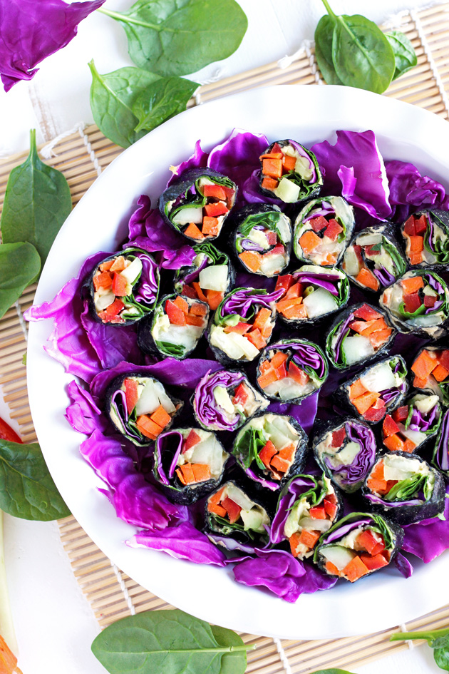 Healthy sushi rolls made with an array a raw veggies so you can eat the rainbow! NeuroticMommy.com #raw #vegan #healthy