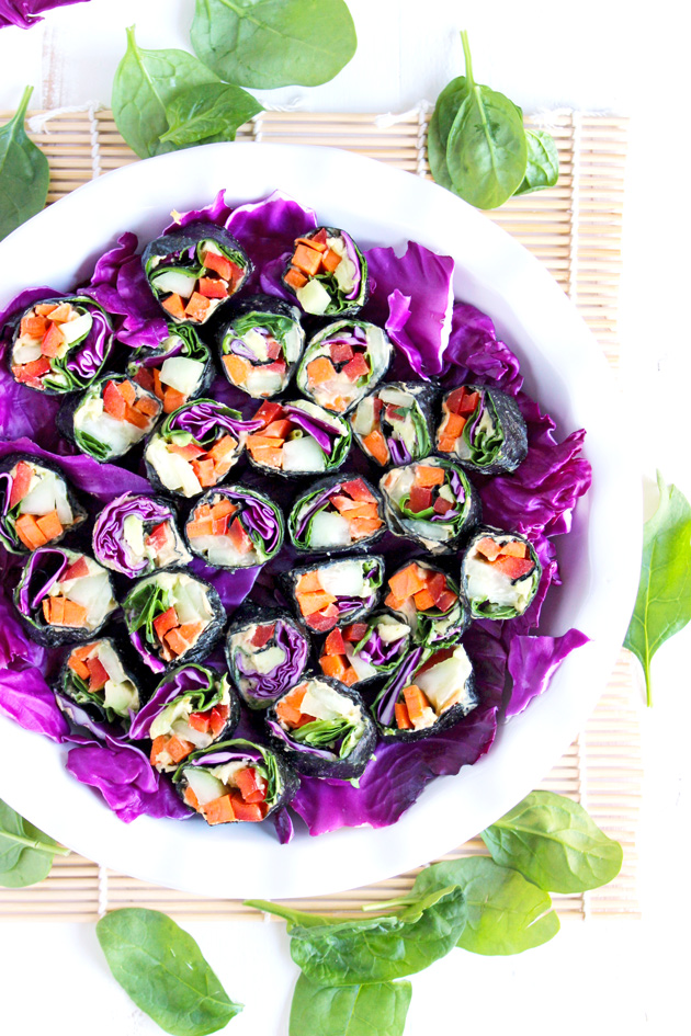 Healthy sushi rolls made with an array a raw veggies so you can eat the rainbow! NeuroticMommy.com #raw #vegan #healthy