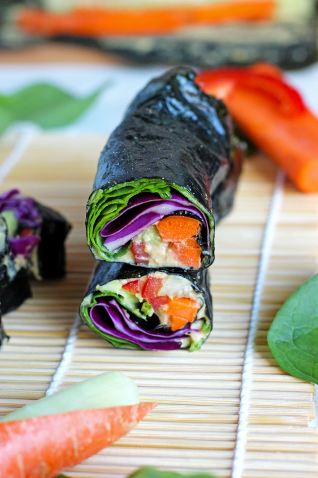 Healthy sushi rolls made with an array a raw veggies so you can eat the rainbow! NeuroticMommy.com #raw #vegan #healthy