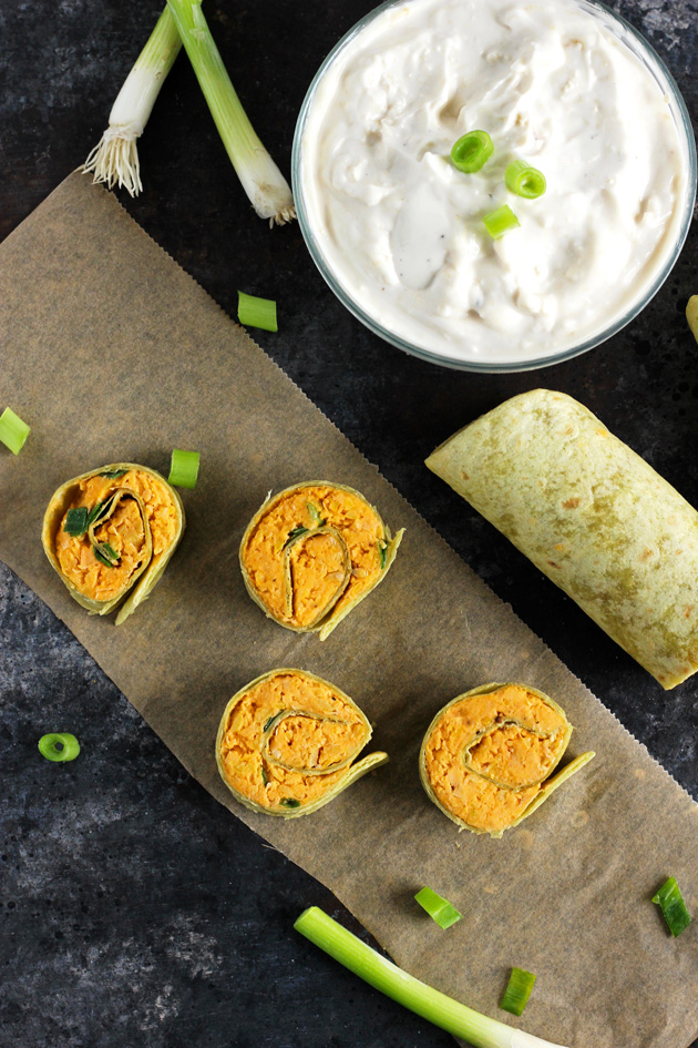 Buffalo Chickpea Pinwheels with Vegan Blue Cheese - Vegan fingerfood made healthy! Homemade buffalo sauce with mashed chickpeas, wrapped in a spinach tortilla, with vegan blue cheese for dipping! NeuroticMommy.com #vegan #healthy