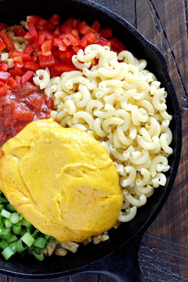 One Skillet Vegan Hamburger Helper - Using a homemade vegan cheese sauce and tempeh, giving this meal the healthy twist it deserves. Ultra cheesy, kid and adult approved. NeuroticMommy.com #vegan #healthy