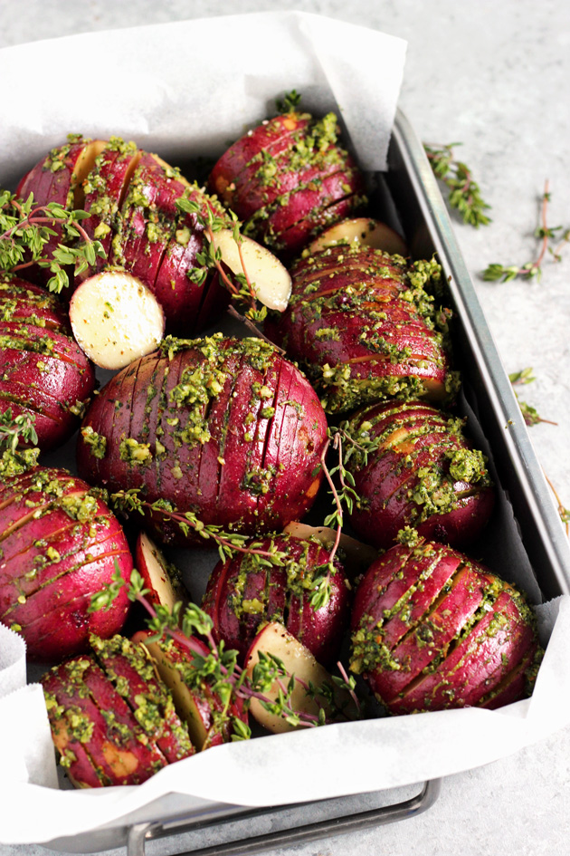 Pesto Herb Roasted Potatoes - Enjoy these oven baked pesto herb filled roasted potatoes that are completely heart healthy and naturally gluten and fat free. It's a triple win! NeuroticMommy.com #vegan #healthy