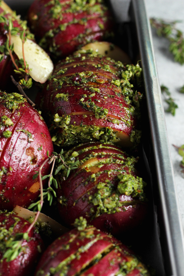 Pesto Herb Roasted Potatoes - Enjoy these oven baked pesto herb filled roasted potatoes that are completely heart healthy and naturally gluten and fat free. It's a triple win! NeuroticMommy.com #vegan #healthy