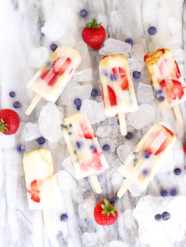 Fruit Fun Yogurt Ice Pops - Cool down with these fresh strawberry blueberry creamy yogurt ice pops that your whole family will LOVE! They're the perfect dairy-free frozen treat on the hottest of summer days. NeuroticMommy.com #healthy #vegan #summer #snacks