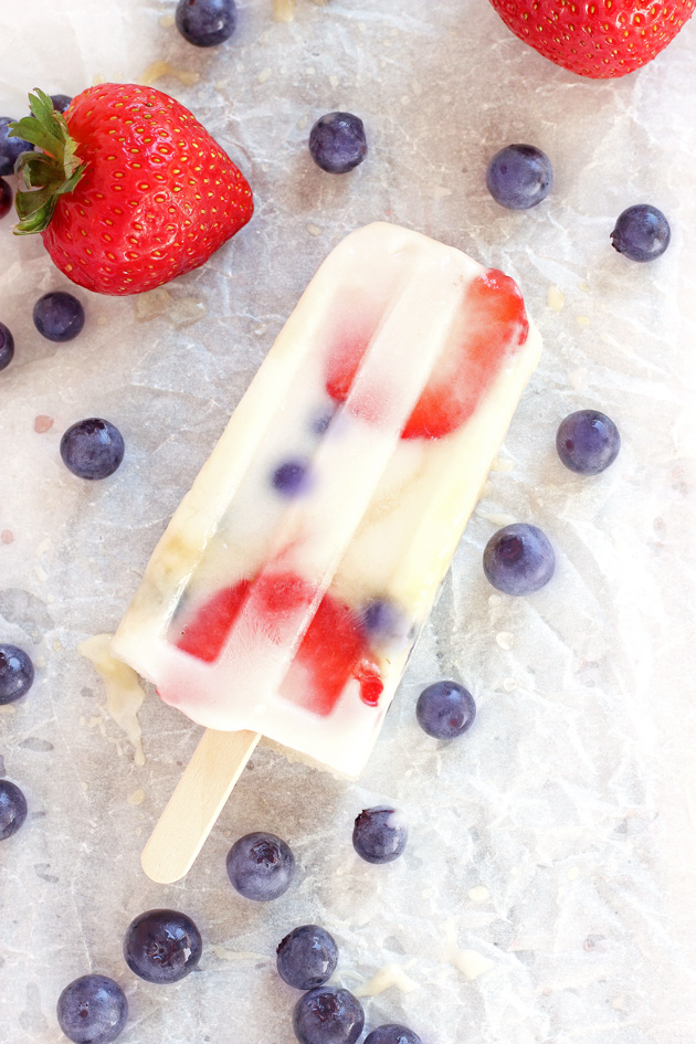 Fruit Fun Yogurt Ice Pops - Cool down with these fresh strawberry blueberry creamy yogurt ice pops that your whole family will LOVE! They're the perfect dairy-free frozen treat on the hottest of summer days. NeuroticMommy.com #healthy #vegan #summer #snacks