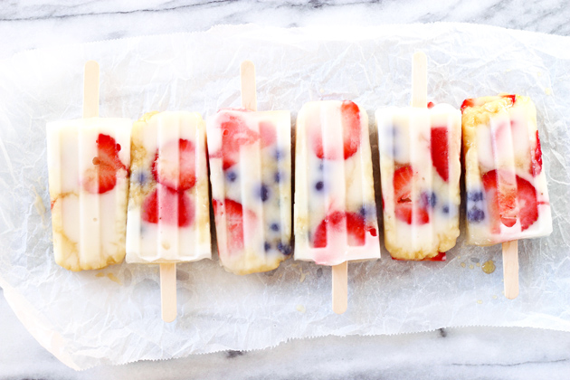 Fruit Fun Yogurt Ice Pops - Cool down with these fresh strawberry blueberry creamy yogurt ice pops that your whole family will LOVE! They're the perfect dairy-free frozen treat on the hottest of summer days. NeuroticMommy.com #healthy #vegan #summer #snacks