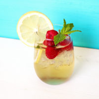 Raspberry Lemonade Spritzer - Refreshing, cool, and for adults only. This simple no-frills classic is meant for any mom or parent who wants to enjoy some down time with a tasty, fruity, alcoholic beverage! NeuroticMommy.com #momlife #vegan