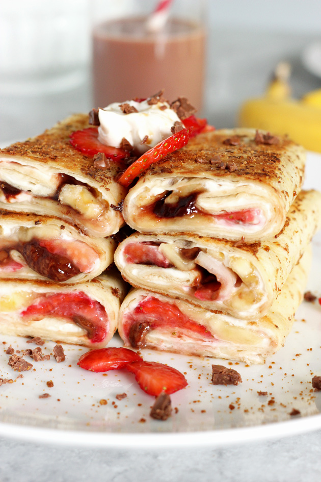 Stuffed Tortilla Cheesecake French Toast - This is the best breakfast, dessert, snack, ever! Stuffed with healthy dark chocolate, strawberries, bananas, and vegan cream cheese, you legit can't go wrong. NeuroticMommy.com #vegan #brunch #healthy