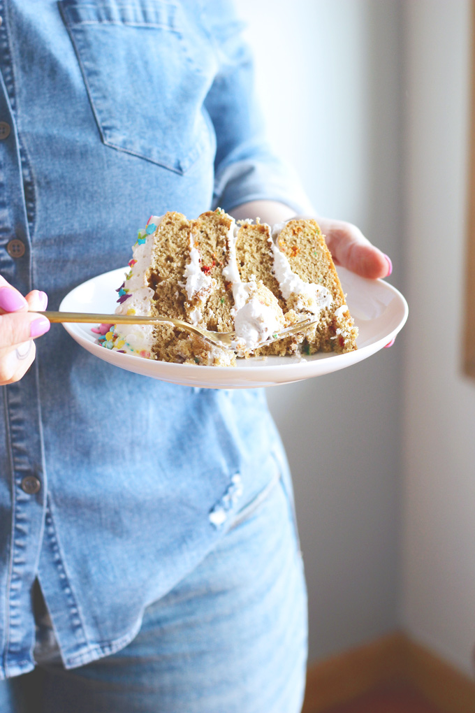 Unicorn Birthday Cake Celebrations - Celebrate with NeuroticMommy bringing in her birthday colorful, sparkly, and full of love! This vanilla dream unicorn cake is totally vegan and overloaded with coconut whipped cream! NeuroticMommy.com #birthdaycake #vegan #cake