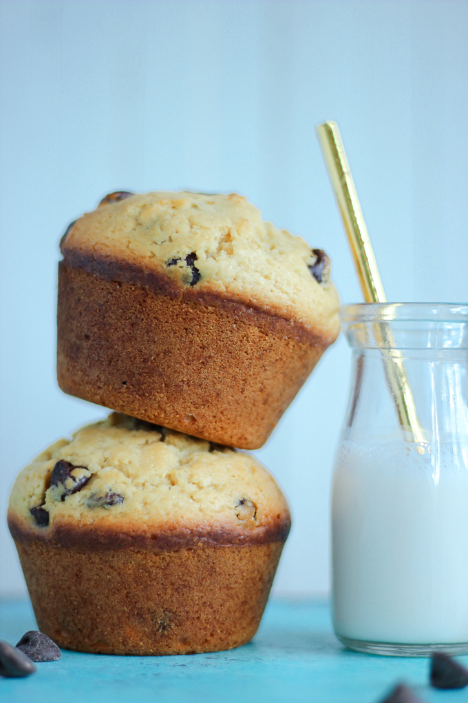 Jumbo Bakery Style Chocolate Chip Muffins - These vegan fluffy and moist muffins are perfect for breakfast, brunch or snack time. Each bite filled with melty chocolate chips! NeuroticMommy.com #vegan #muffins #snacks