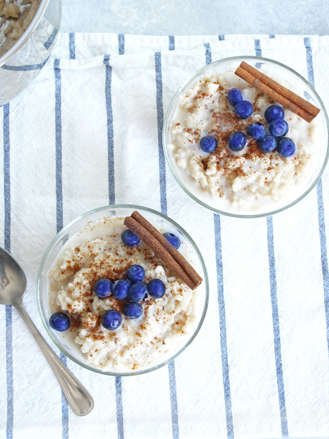 Vegan Coconut Rice Pudding - A healthy, vegan and gluten free snack can be made with white or brown rice and is cooked in coconut milk. The texture is dreamy and there are no refined sugars! NeuroticMommy.com #vegan #glutenfree #snacks #ricepudding