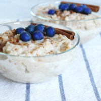 Vegan Coconut Rice Pudding - A healthy, vegan and gluten free snack can be made with white or brown rice and is cooked in coconut milk. The texture is dreamy and there are no refined sugars! NeuroticMommy.com #vegan #glutenfree #snacks #ricepudding