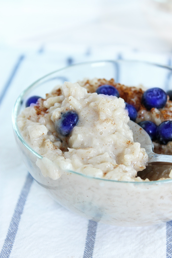 Vegan Coconut Rice Pudding - A healthy, vegan and gluten free snack can be made with white or brown rice and is cooked in coconut milk. The texture is dreamy and there are no refined sugars! NeuroticMommy.com #vegan #glutenfree #snacks #ricepudding