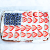 American Flag Chocolate Pudding Poke Cake - A festive fun way to decorate your cakes this summer. Made with all vegan ingredients and coconut whip cream, you cannot go wrong. NeuroticMommy.com #vegan #cake #chocolate
