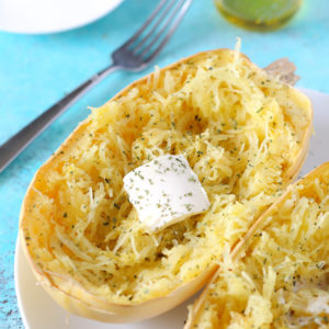 My Favorite Way To Eat Spaghetti Squash - Using garlic, olive oil and vegan butter, it's one of the easiest most delicious ways to enjoy this vegetable. NeuroticMommy.com #squash #spaghetti #lowcarb