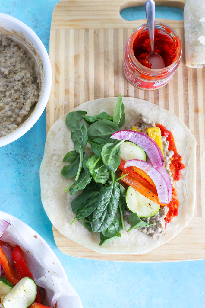 Mashed Lentil Wrap Loaded With Veggies - The ultimate wrap packed with plant based protein an a whole lotta goodness. NeuroticMommy.com #vegan #backtoschool #easyveganrecipes #lentils