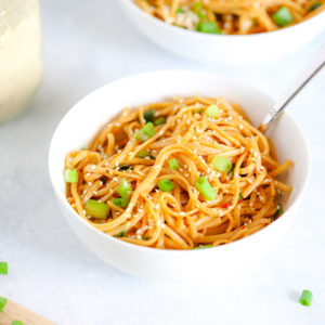 Spicy Vegan Sesame Noodles - An easy to make weeknight dinner made with a pasta or noodle of choice and some easy to put together spices. Can be made non spicy for less hotness. NeuroticMommy.com #veganrecipes #sesamenoodles #easydinners