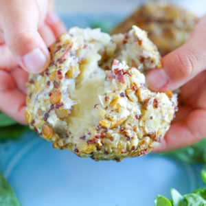 Vegan Mozzarella Stuffed Rice Balls with Lentils and Red Quinoa - A high protein plant based snack or meal you can eat alone or a top of a salad or even paired with pasta. Super cheesy and delicious. NeuroticMommy.com #plantbasedprotein #snacks #veganriceballs