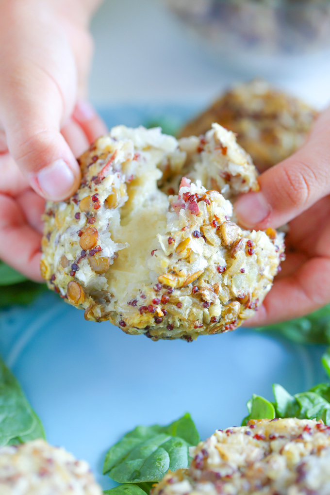 Vegan Mozzarella Stuffed Rice Balls with Lentils and Red Quinoa - A high protein plant based snack or meal you can eat alone or a top of a salad or even paired with pasta. Super cheesy and delicious. NeuroticMommy.com #plantbasedprotein #snacks #veganriceballs