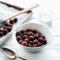 Homemade Vegan Cocoa Puffs - 4 ingredient chocolatey cereal that's naturally sweetened and perfect for breakfast! You can even enjoy these as a dry snack. NeuroticMommy.com #vegan #cereal #cocoapuffs