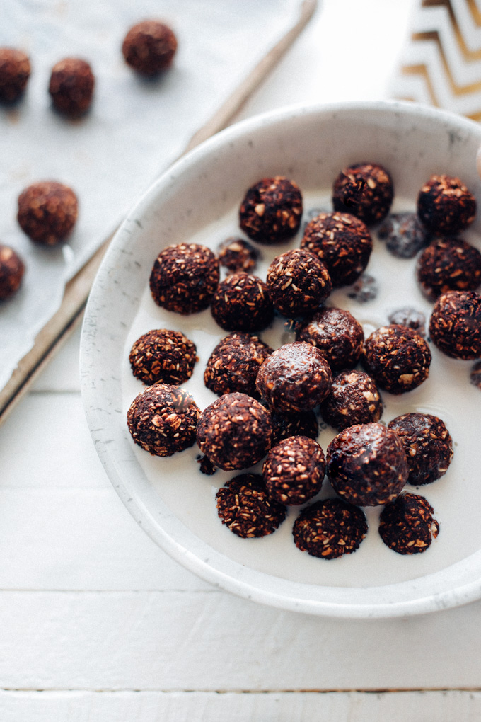 Homemade Vegan Cocoa Puffs - 4 ingredient chocolatey cereal that's naturally sweetened and perfect for breakfast! You can even enjoy these as a dry snack. NeuroticMommy.com #vegan #cereal #cocoapuffs