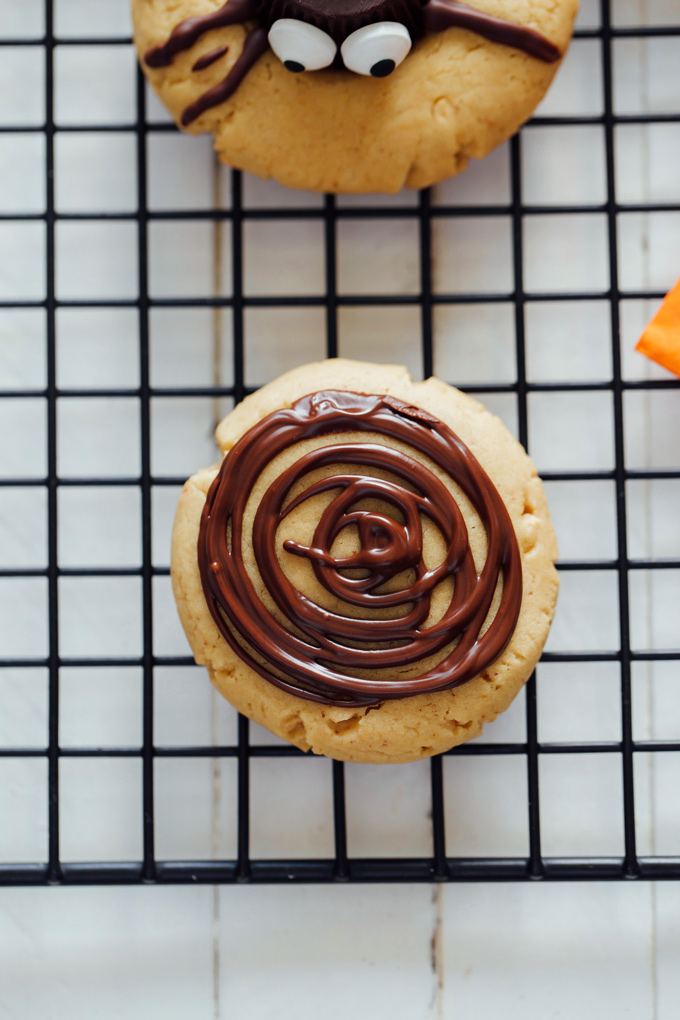 Spooky Spider Cookies - These vegan peanut butter gems are drizzled in sweet dark chocolate are chewy and full of deliciousness in every bite! The perfect tasty little snack for Halloween and super spooky! NeuroticMommy.com #vegancookies #halloween #vegansnacks