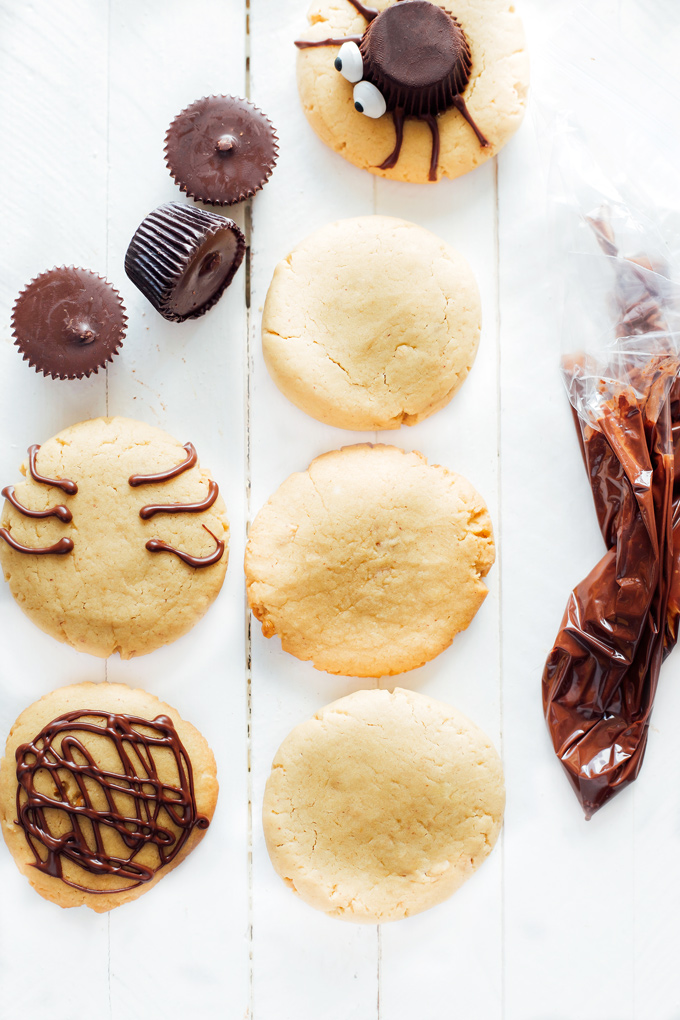 Spooky Spider Cookies - These vegan peanut butter gems are drizzled in sweet dark chocolate are chewy and full of deliciousness in every bite! The perfect tasty little snack for Halloween and super spooky! NeuroticMommy.com #vegancookies #halloween #vegansnacks