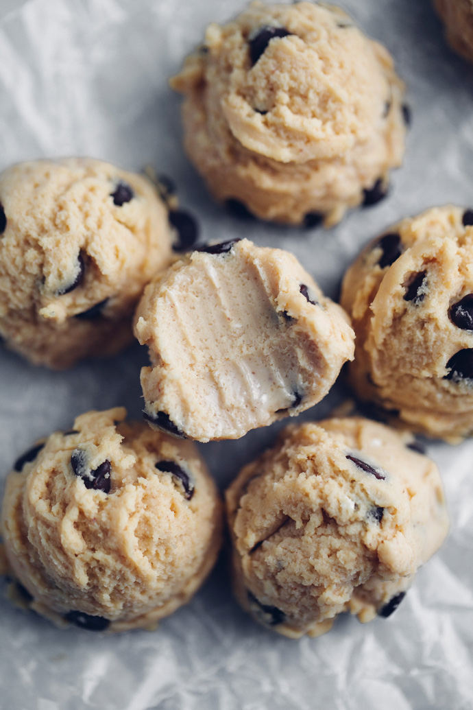 Vegan Cookie Dough Cheesecake Bites - If your a cookie dough and cheesecake lover then these are the bites for you! Made with sugar free dark chocolate chips, sweetened with monk fruit, making this low carb snack a must have. NeuroticMommy.com #vegan #fatbomb #keto #snacks