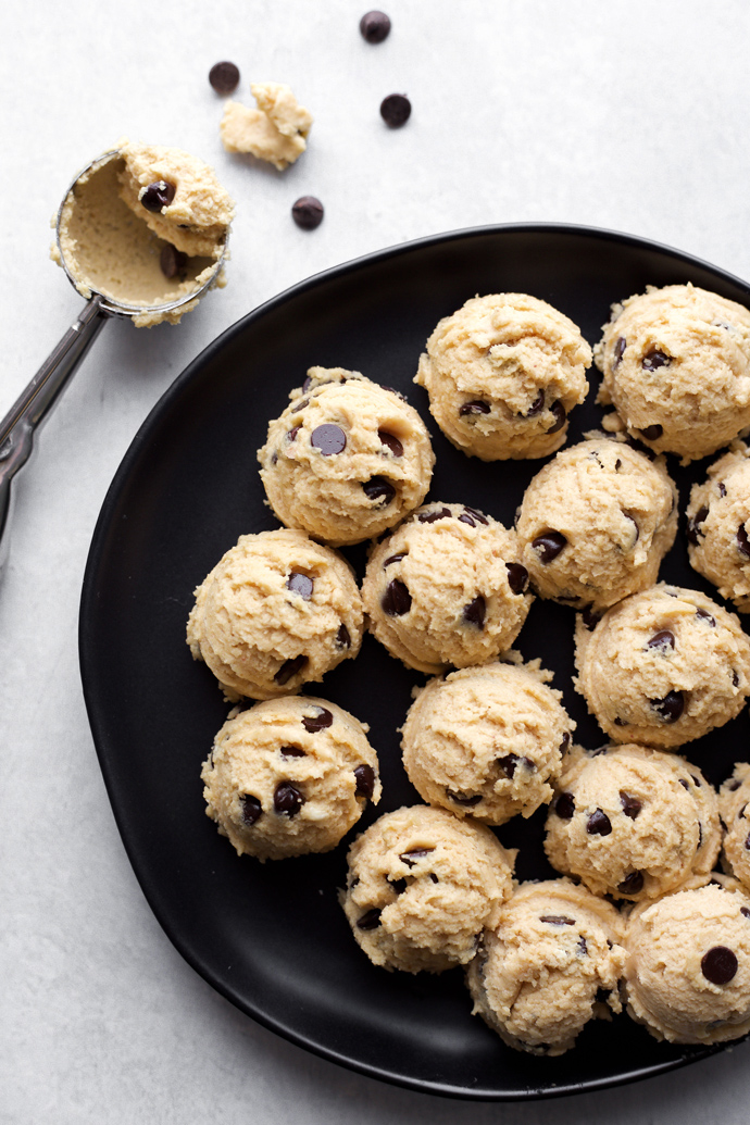 Vegan Cookie Dough Cheesecake Bites - If your a cookie dough and cheesecake lover then these are the bites for you! Made with sugar free dark chocolate chips, sweetened with monk fruit, making this low carb snack a must have. NeuroticMommy.com #vegan #fatbomb #keto #snacks