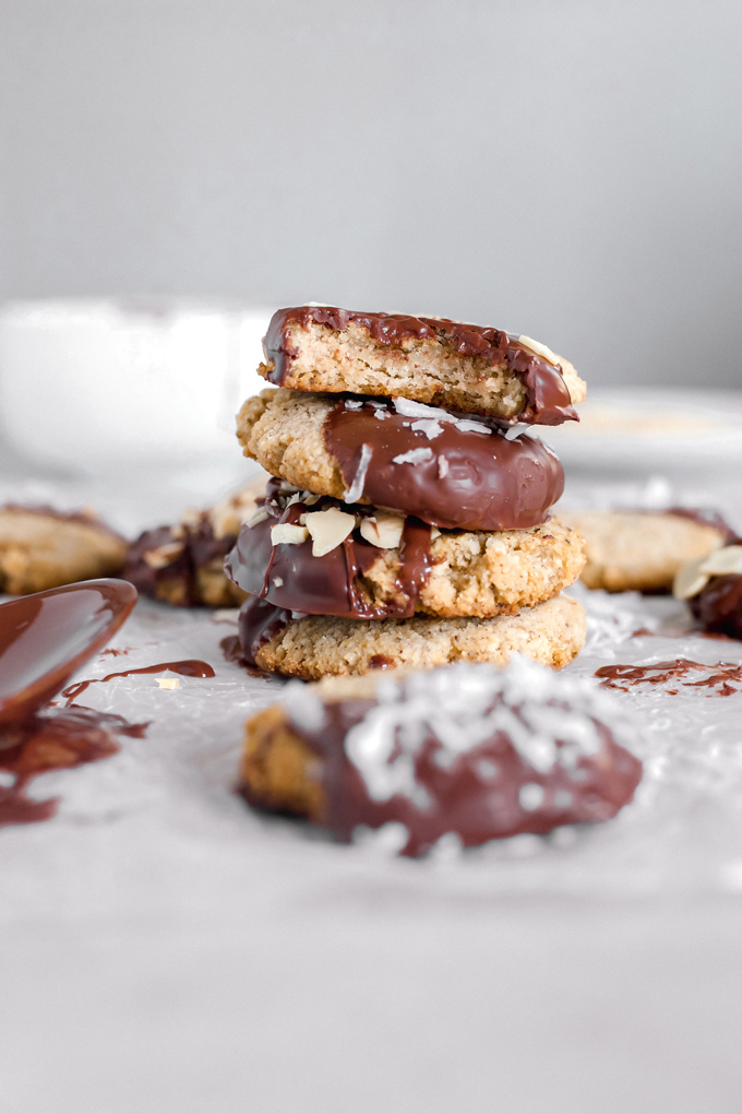 Almond Cookies Dipped in Dark Chocolate (Vegan - Sugar Free) - Where chewy cookies meet dark chocolate for an awesomely sweet sugar free snack you can feel good about! NeuroticMommy.com #vegan #sugarfree #glutenfree