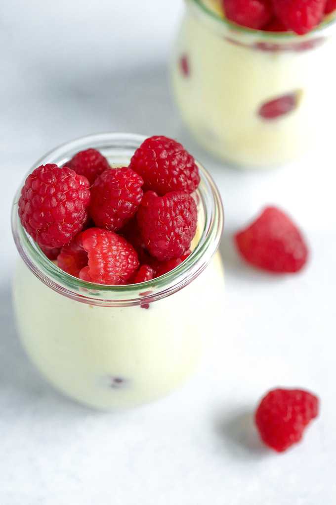 Vegan Vanilla Pudding with Raspberries - Sweet vanilla pudding made with coconut milk paired with raspberries for Valentine's Day. NeuroticMommy.com #vegan #valentinesday