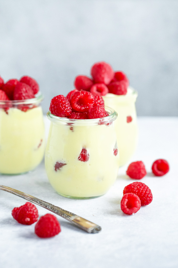 Vegan Vanilla Pudding with Raspberries - Sweet vanilla pudding made with coconut milk paired with raspberries for Valentine's Day. NeuroticMommy.com #vegan #valentinesday