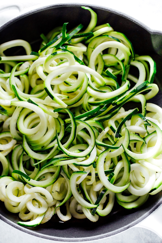 Zucchini Noodles in a Garlic Lemon Vegan Cream Sauce -This is a fresh and simple meal done and ready in less than 20 minutes. You can whip this up any day of the week keeping it comforting with a healthy twist. NeuroticMommy.com #vegan #dairyfree #glutenfree