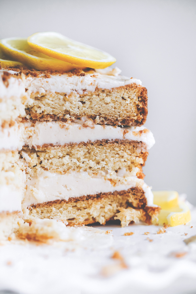 This spectacular Vegan Lemon Cream Layer Cake is a delectable cake for the most special of occasions. Enjoy the creamy lemon buttercream sandwiched between layers of homemade vanilla cake. NeuroticMommy.com #vegan #cake #easter