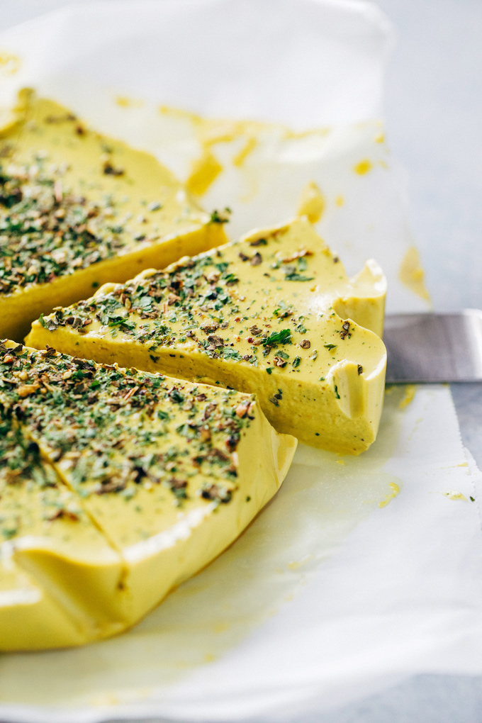 How To Make Herbed Cashew Cheese-Super cheesy texture with a salt and nutty flavor. Put this on your next vegan cheese board or serve it up on some veggie burgers for the win. Either way you're going to love it! NeuroticMommy.com #vegancheese #dairyfree