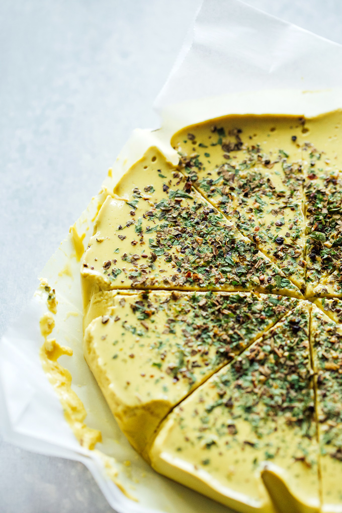 How To Make Herbed Cashew Cheese-Super cheesy texture with a salt and nutty flavor. Put this on your next vegan cheese board or serve it up on some veggie burgers for the win. Either way you're going to love it! NeuroticMommy.com #vegancheese #dairyfree