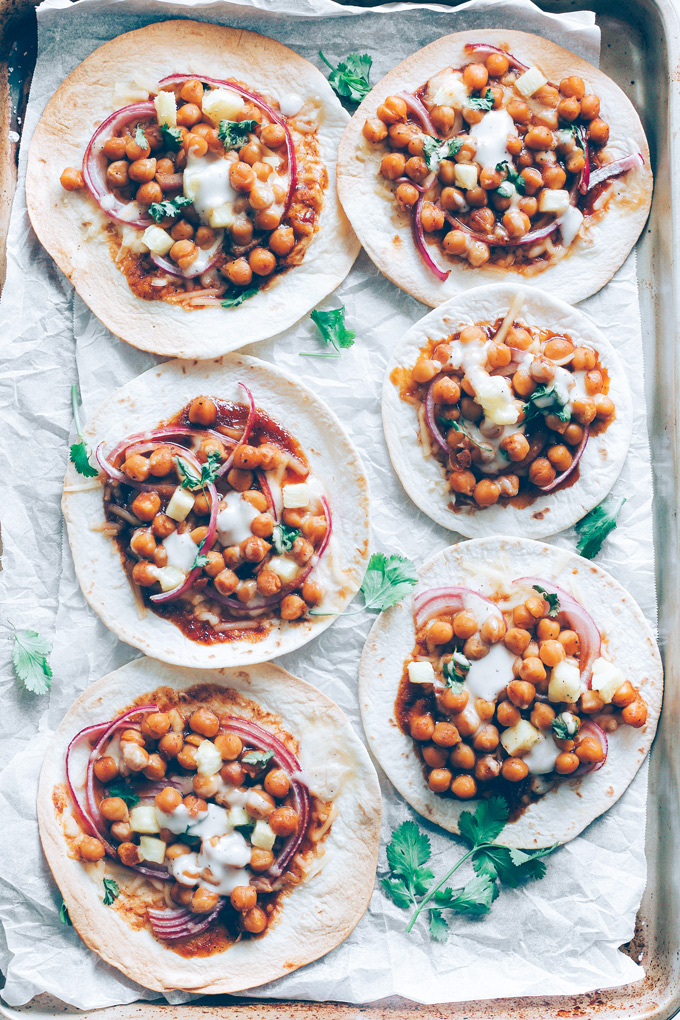 Vegan BBQ Chickpea Pizzas - BBQ coated chickpeas on top of melty vegan mozzarella cheese and loaded with so much goodness, makes this vegan pizza night a keeper! NeuroticMommy.com #veganpizza