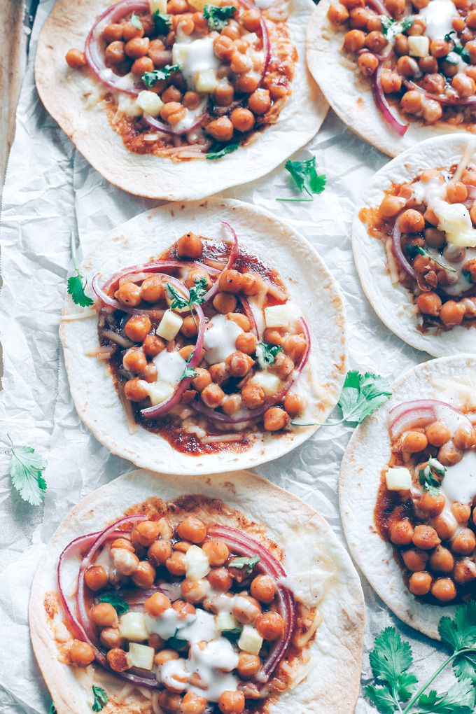 Vegan BBQ Chickpea Pizzas - BBQ coated chickpeas on top of melty vegan mozzarella cheese and loaded with so much goodness, makes this vegan pizza night a keeper! NeuroticMommy.com #veganpizza